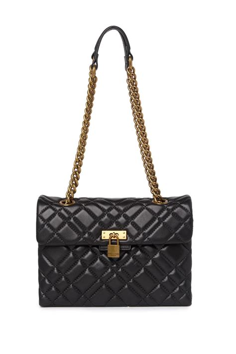 Kurt geiger lock bag - The Kensington Drench Bag is crafted from a soft lambskin leather with signature parquet padded overstitch quilt with three rows of weave pattern. The black metal Eagle head features jet black crystals and black crystal eyes on the front flap. 